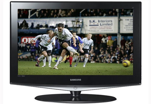 Samsung LE32R74BDX 32-inch LCD TV displaying a football match with clear image quality and vibrant colors on a black stand.
