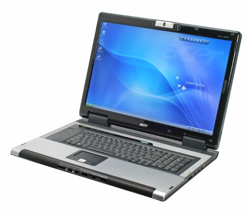 Acer Aspire 9800 series notebook with a 20-inch screen open on a white background showing the desktop with wallpaper and Acer logo.