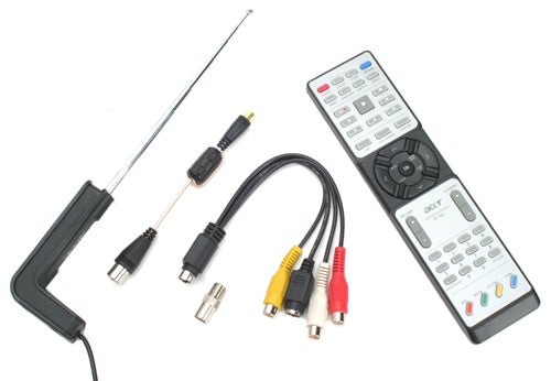 Accessories for Acer Aspire 9800 notebook including an antenna, remote control, and various cables.