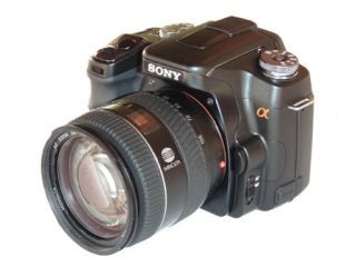Sony Alpha a100 DSLR camera with lens attached.