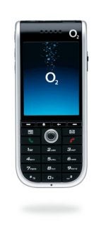 O2 Xda IQ smartphone with a black and silver color scheme, showcasing its screen with the O2 logo and a digital keypad below.