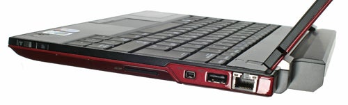 Red and black laptop with ports visible on the side, featuring an HDMI port, USB ports, and an Ethernet port