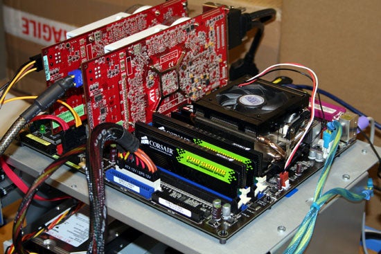 NVIDIA GeForce 7950 GX2 graphics card installed in a computer system along with Corsair memory modules, showcasing the internal configuration for a performance test setup.