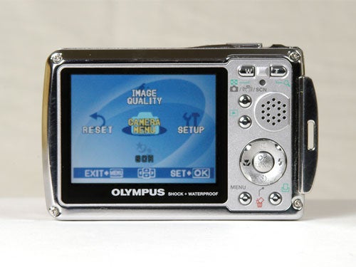 Olympus µ 720SW rugged digital camera with the screen displaying menu options including image quality, reset, camera menu, and setup.