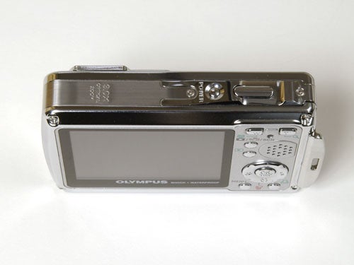 Olympus µ 720SW rugged digital camera displayed on a white background showing its LCD screen and control buttons.