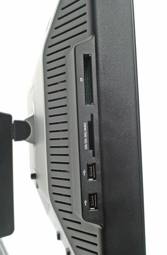 Side view of a Dell Ultrasharp 2407WFP 24-inch widescreen monitor showing USB ports and a card reader.