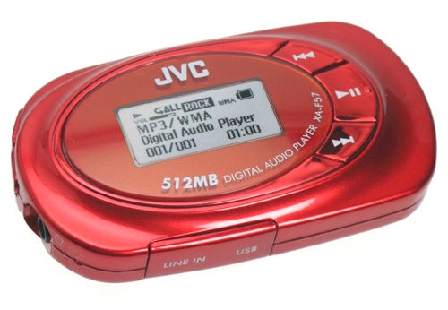 JVC Alneo XA-F57 MP3 player in metallic red with a 512MB capacity, featuring a small display screen and control buttons, with "LINE IN" and "USB" ports visible.