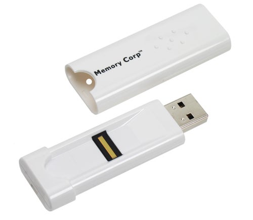 Memory Corp Biometric USB Memory Key (256MB) with fingerprint scanner, USB connector extended and cap removed, against a white background.