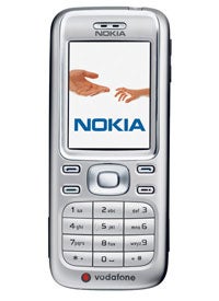 Nokia 6234 mobile phone with a silver front, branded with Vodafone, showing a welcome screen with the Nokia logo and two hands shaking.
