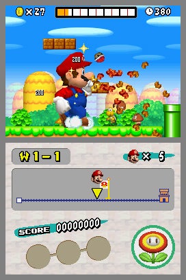 Screenshot of gameplay from New Super Mario Bros. showing Mario jumping to hit a block, with a score display and World 1-1 level indication on the bottom screen.