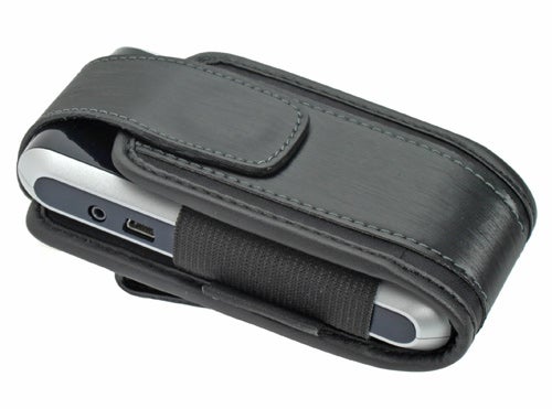 BlackBerry 7130g smartphone in a horizontal black leather case with a magnetic closure flap and elastic side bands.