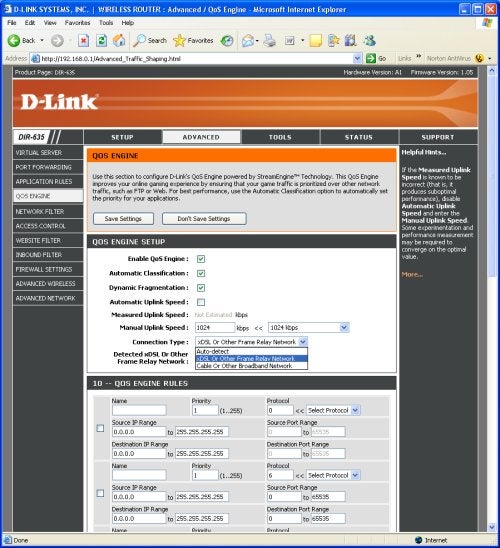 Screenshot of the D-Link DIR-635 router's QoS engine setup page displayed on a computer screen with web interface options for enabling QoS, dynamic fragmentation, and manual uplink speed configuration.Screenshot of the D-Link DIR-635 router's web interface showing the schedule rules list for wireless settings in the browser window, indicating options to configure network access schedules.