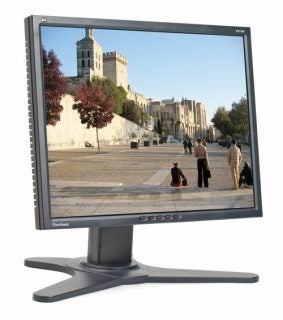 ViewSonic VP2130b 21-inch LCD monitor displaying a vibrant outdoor scene with a castle and pedestrians on the screen, placed against a white background.