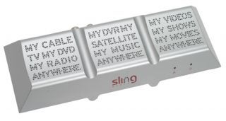 SlingMedia Slingbox device for streaming TV content remotely.
