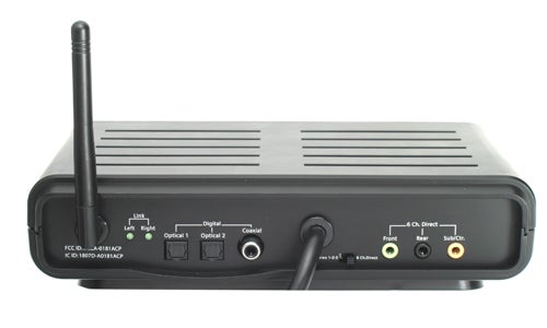 A Logitech Z-5450 wireless speaker's control center unit with various inputs and outputs, an antenna on the left side, and LED indicators for link status and different audio channels.