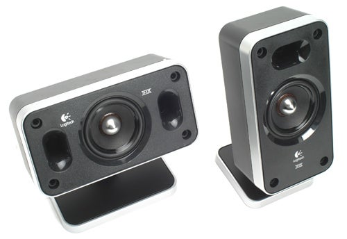 Two Logitech Z-5450 wireless satellite speakers on a white background, featuring sleek black design with silver accents and the Logitech logo on the bottom corner.