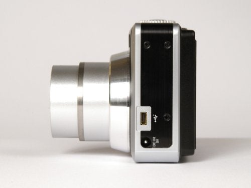 Acer CP-8660 digital camera with lens extended, displaying USB and HDMI ports on camera's side on a white background.