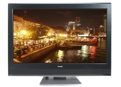 Toshiba Regza 42WLT66 42-inch LCD TV displaying a vibrant night scene with city lights reflecting off a river.