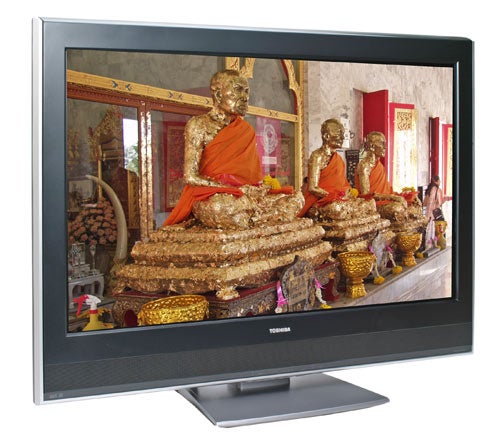 Toshiba Regza 42WLT66 42-inch LCD TV displaying an image of golden Buddha statues in a temple setting.