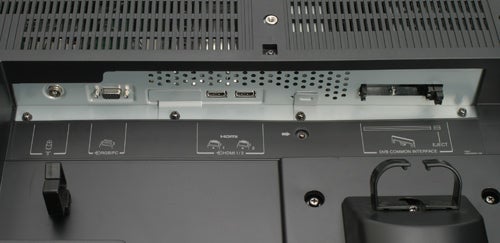 Close-up view of the rear connectivity panel on Toshiba Regza 42WLT66 - 42in LCD TV, showing various input/output ports including HDMI, S-Video, and audio outputs.