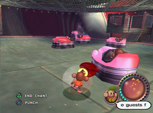 Screenshot from the video game Super Monkey Ball Adventure showing a gameplay moment with a character performing an action inside a level featuring mechanical enemies and a heads-up display with game controls.