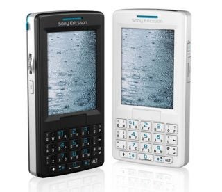 Sony Ericsson M600i smartphones in black and white, standing vertically with qwerty keyboards and touchscreen displays.