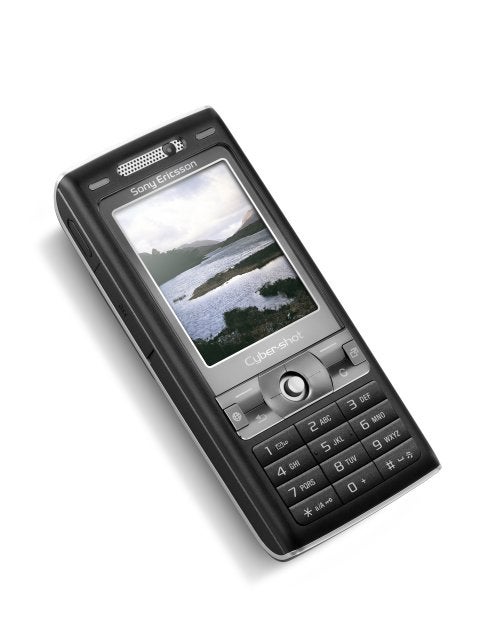 Sony Ericsson K800i mobile phone with the camera branded Cybershot displayed on a white background, showcasing its screen with a wallpaper of a landscape, numerical keypad, and navigation buttons.