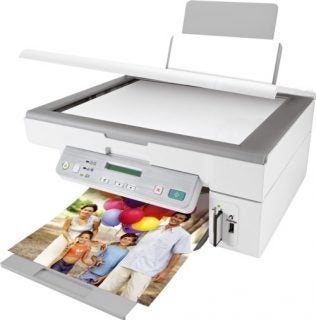Lexmark X3480 Multi-Function Printer with an open scanner lid and a printed photo ejecting from the output tray, showing a family with balloons.