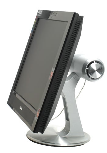 Asus PG191 Gaming Monitor with black and silver design, featuring a built-in subwoofer and pivot function on a modern stand.