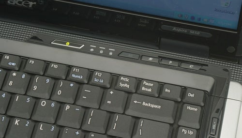 Close-up view of the keyboard and partial screen area of an Acer Aspire 5650 laptop with the model name visible on the screen bezel.