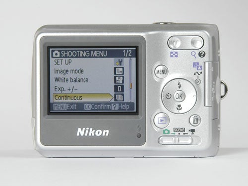 Rear view of a Nikon Coolpix L4 digital camera displaying the shooting menu on its LCD screen.