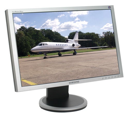 Samsung SyncMaster 205BW widescreen monitor displaying an image of a private jet on a runway.