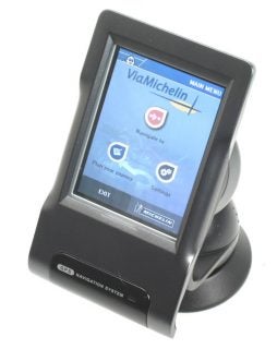HP iPaq rx1950 Navigator GPS on stand displaying menu.