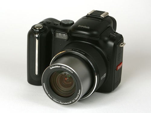 Kodak EasyShare P712 digital camera displayed on a white background showcasing the extended zoom lens and body design.