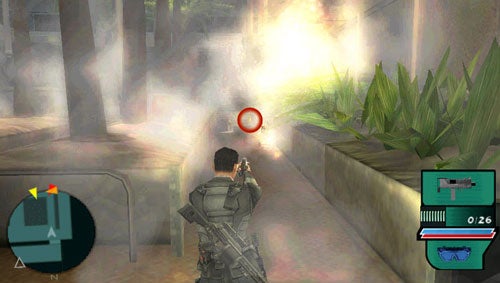 Screenshot of gameplay from Syphon Filter: Dark Mirror showing a character aiming with a gun amidst a smoky environment with a mini-map and ammo count displayed on the user interface.