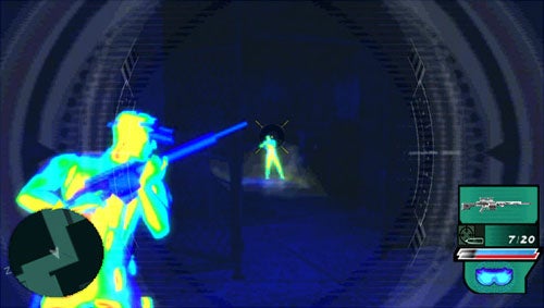 Screenshot from the video game Syphon Filter: Dark Mirror showing a first-person view with a night-vision effect. In the scene, the player character is aiming a sniper rifle at an enemy target highlighted in yellow. There is a HUD (head-up display) showing a compass, ammunition count, and weapon selection.