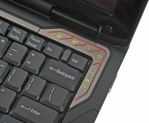 Close-up view of the Acer Ferrari 1000 laptop keyboard highlighting shortcut keys with red accents.