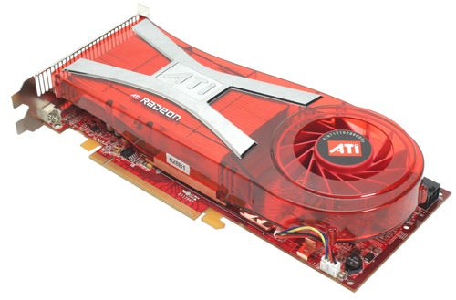 ATI Radeon X1950 XT-X graphics card with red cooler and ATI logo on display against a white background.
