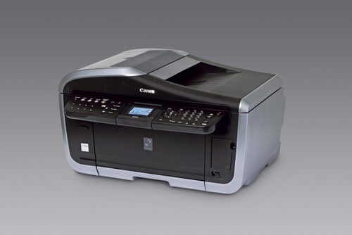 A Canon PIXMA MP830 multi-function printer on a neutral background, showcasing its control panel and dual paper trays.