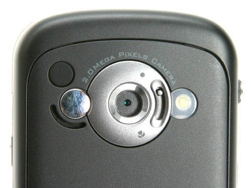 Close-up of the Orange SPV M3100 smartphone's 2.0-megapixel camera with flash and mirror for self-portraits.