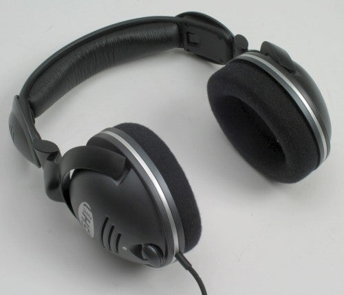 SteelSeries SteelSound 5H v2 gaming headphones with black and grey color scheme, featuring a retractable microphone, on a white background.