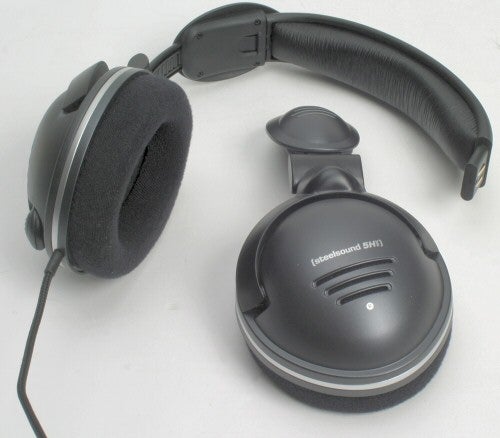 SteelSeries SteelSound 5H v2 gaming headset with black and grey color scheme, featuring large cushioned ear cups, an adjustable headband, and a built-in, retractable microphone on the left ear cup.