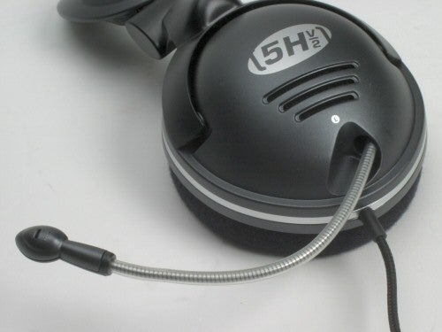 SteelSeries SteelSound 5H v2 gaming headset with retractable microphone and distinctive branding on ear cup.