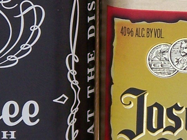 Close-up photo of labels on bottles showing text and logos, demonstrating the detailed image quality captured by the Kodak EasyShare Z650 camera.