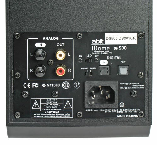 Back panel of Abit iDome DS500 Digital Speaker with inputs and labeling.