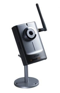D-Link Securicam DCS-2120 IP Camera with antenna mounted on a stand, featuring a front-facing lens and control interface.