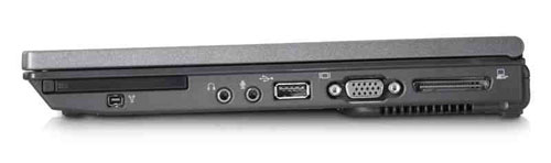 Side view of HP Compaq nc2400 Ultra-Portable Notebook showing various ports including USB, VGA, and others on a grey background.