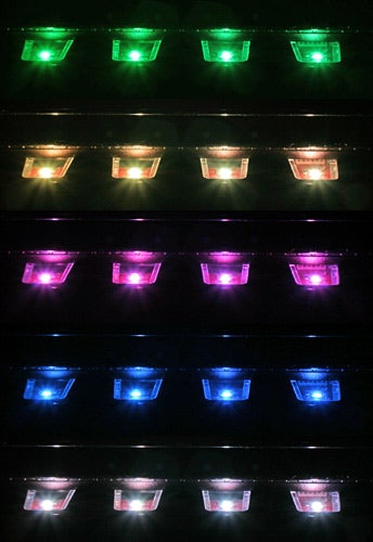 Dell XPS 700 desktop case with customizable LED lights in rows displaying different colors including green, red, purple, and blue.