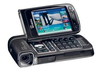 Nokia N93 mobile phone with screen and camera lens visible, showing the multimedia features on display.