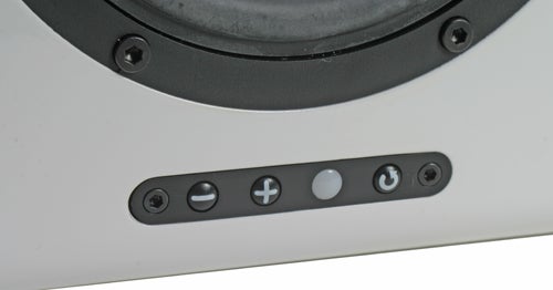 Close-up of a Parrot Bluetooth speaker showing control buttons for power, volume, and Bluetooth pairing.
